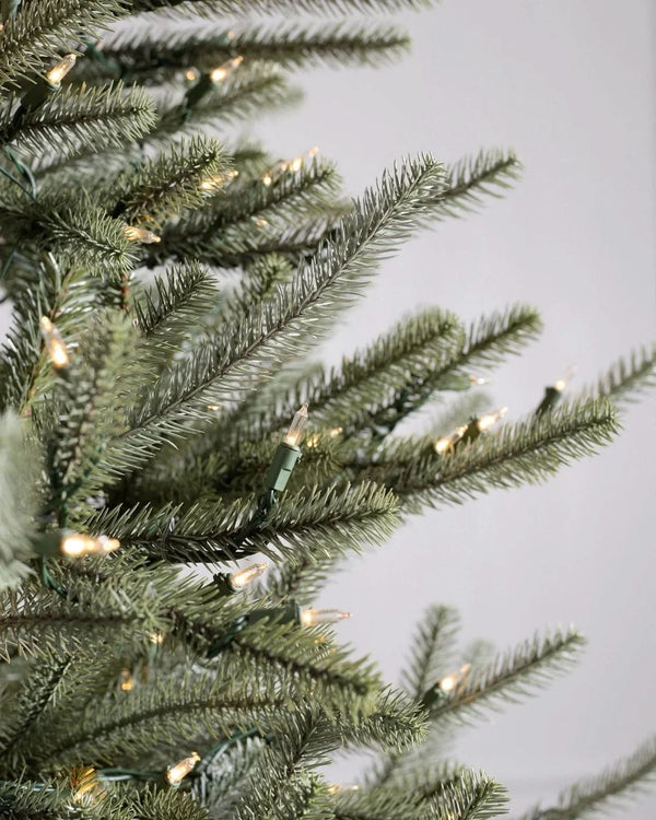 Sanibel Spruce Christmas Tree with Hinged Branches, Metal Stand, and Built-in Micro LEDs