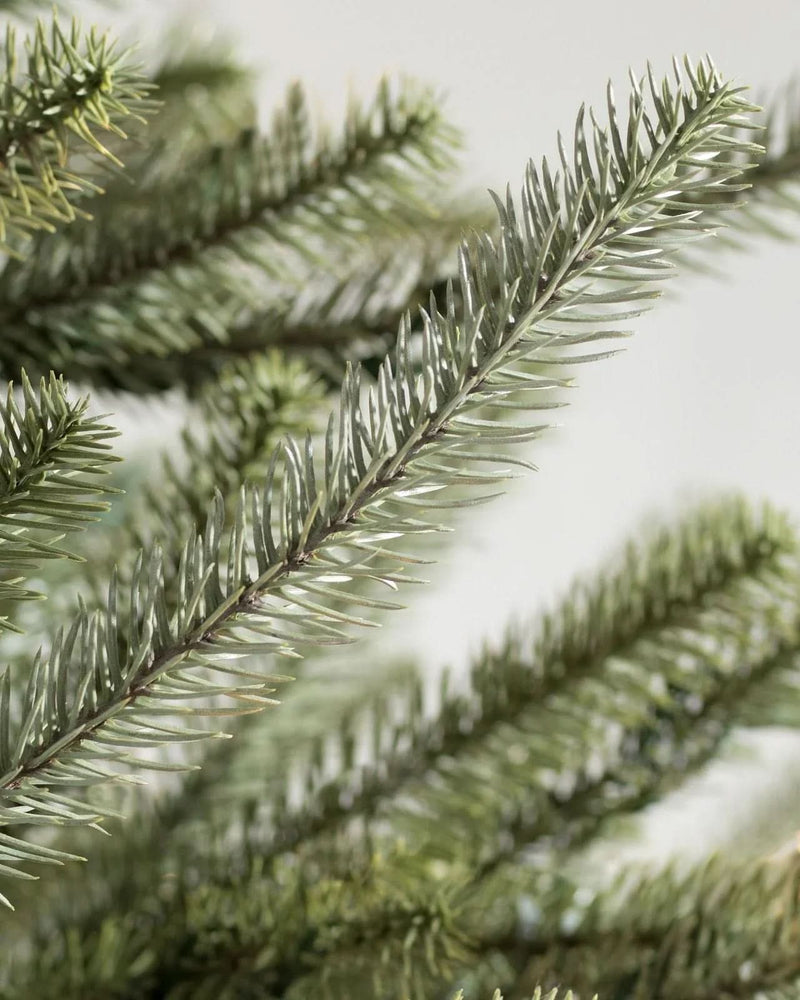 Sanibel Spruce Christmas Tree with Hinged Branches, Metal Stand, and Built-in Micro LEDs