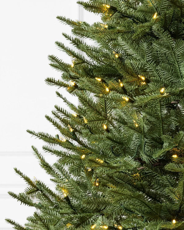 Premium Green Christmas Tree with Hinged Branches, Metal Stand, and Built-in Micro LEDs