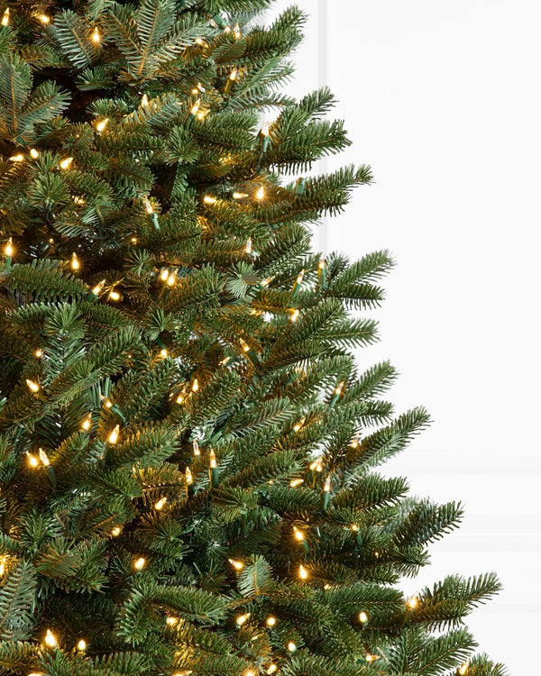 Traditional Green Christmas Tree with Hinged Branches, Metal Stand, and Built-in Micro LEDs